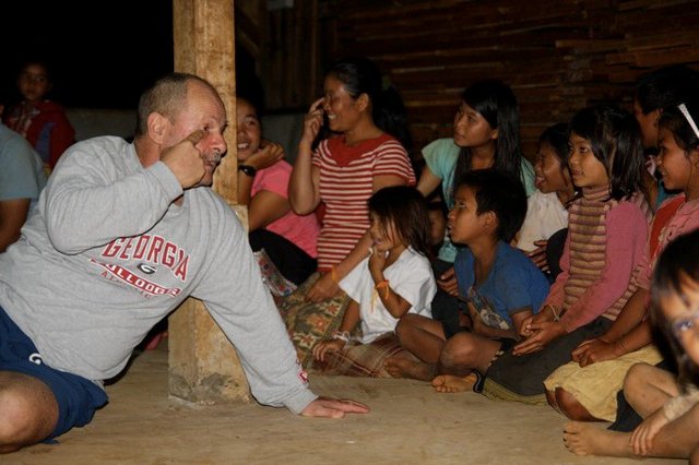 with children on bolaven coffee plantation in laos