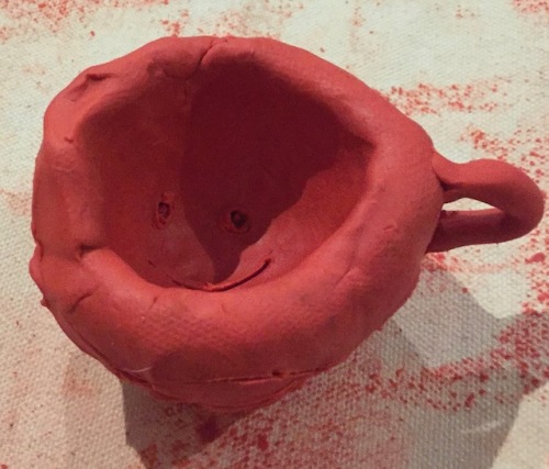 child's clay pot